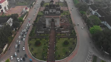 tilt up shot of patuxay war memorial gate at vientiane laos, aerial