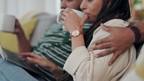 Couple,-laptop-and-hug-with-coffee-in-home