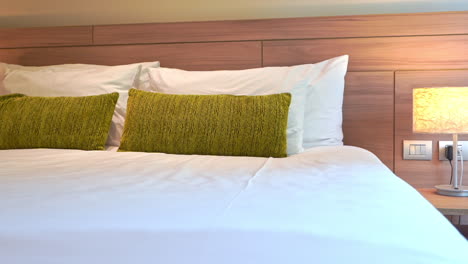 panning shot of tidy double bed