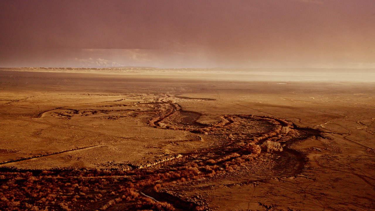 Drone footage of a winter storm engulfing the wide-open plains of New Mexico
