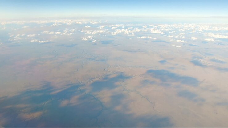 Many rivers from mid screen to bottom of screen in outback Australia on flight Darwin to Sydney Northern Territory Australia