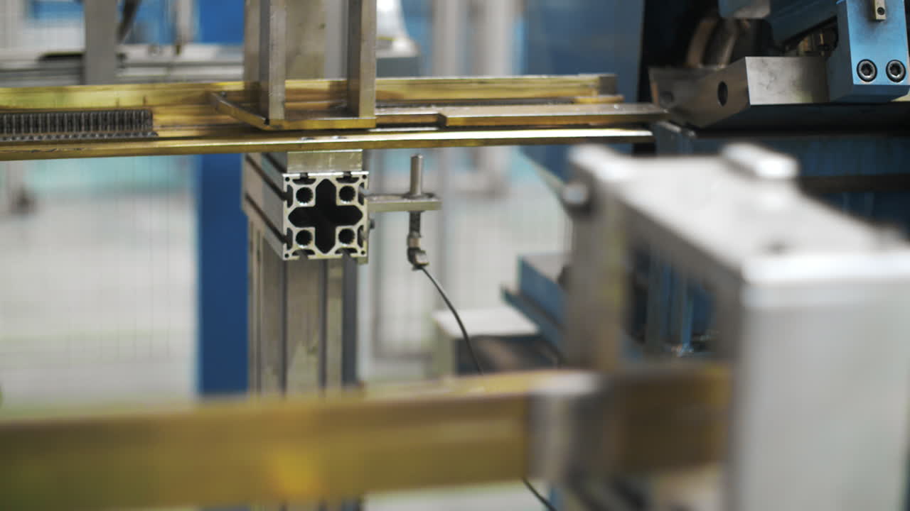 Manufacturing steel detail for household appliances at industrial machine