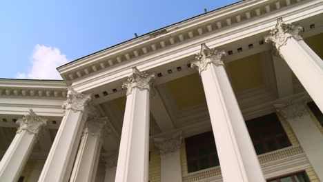 architectural detail of a building with classical columns