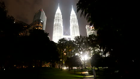 silver beams cut through the city night, a dazzling, breathtaking sight
