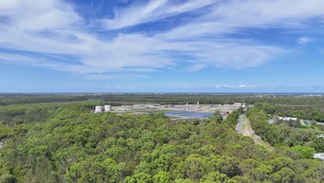 aerial footage of forest and water treatment facility