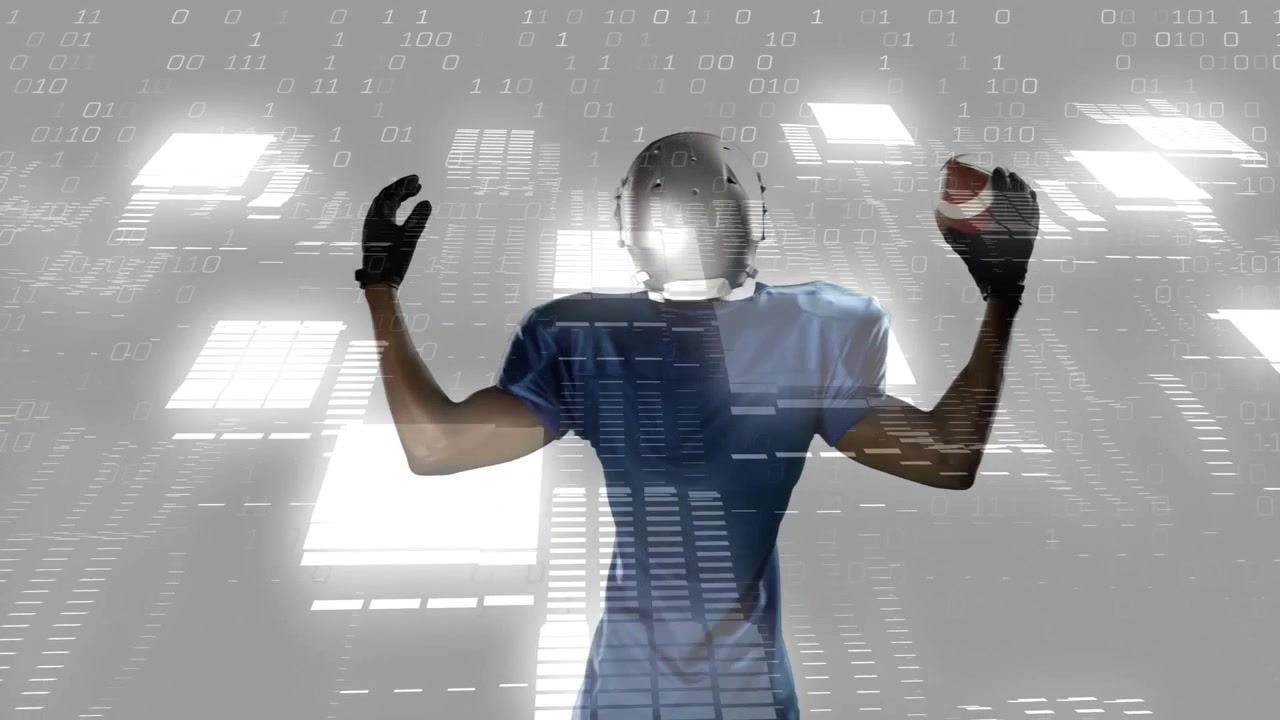 Quarterback raising arms shifting before catching football in studio with binary code for practice