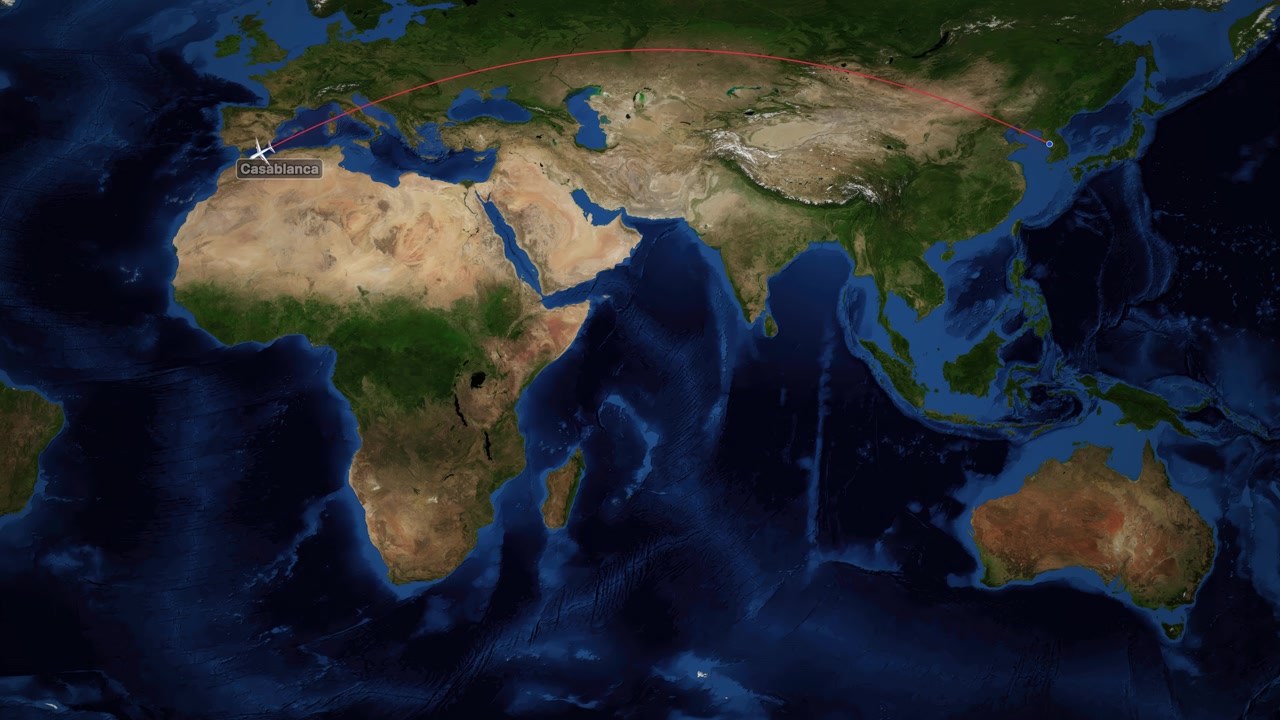 Mappa del mondo digitale che traccia un aereo bianco in volo da Seul a Casablanca con linee rosse