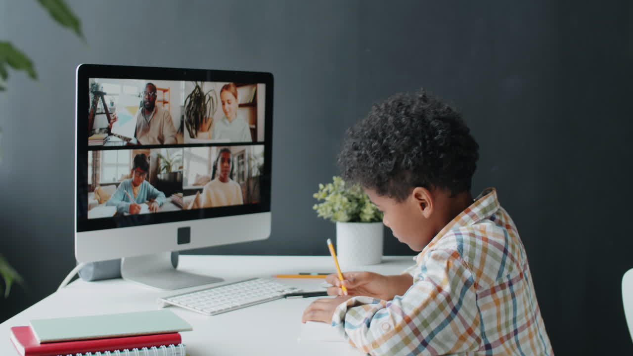 African American Boy Taking Online Class at Home