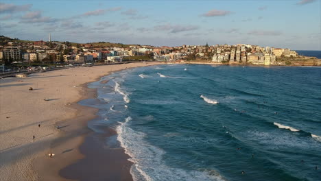 Surfers-and-bodysurfers-from-the-air-Sydney-Bondi-Beach-4k-drone