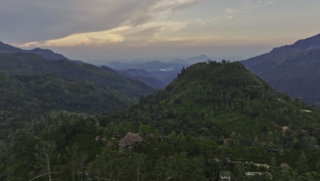 ella sri lanka aerial v13 cinematic drone flyover hillside resort hotels capturing lush green landscape of central highlands at dawn featuring little adam's peak - shot with mavic 3 cine - april 2023