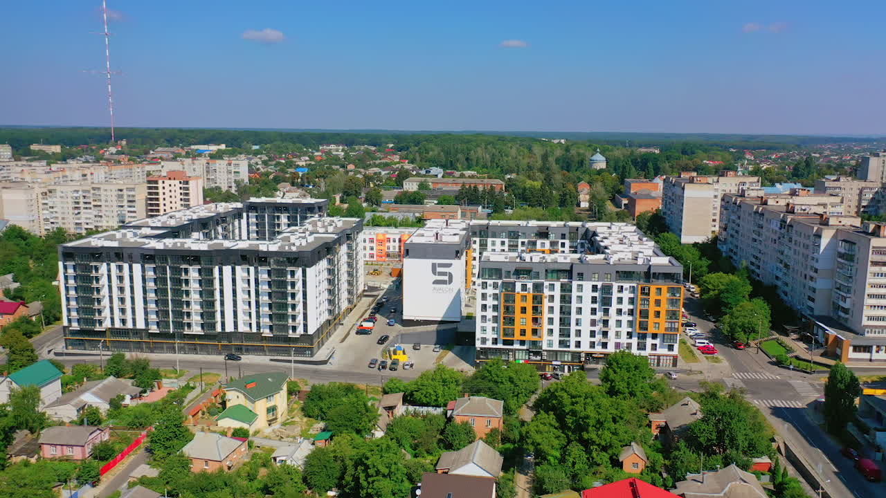 Newly built district. Modern high-rise buildings. Urban landscape. Copter video. Panoramic video.
