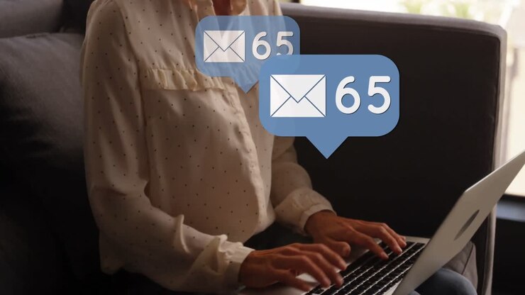 Animation of icons and numbers over woman using laptop