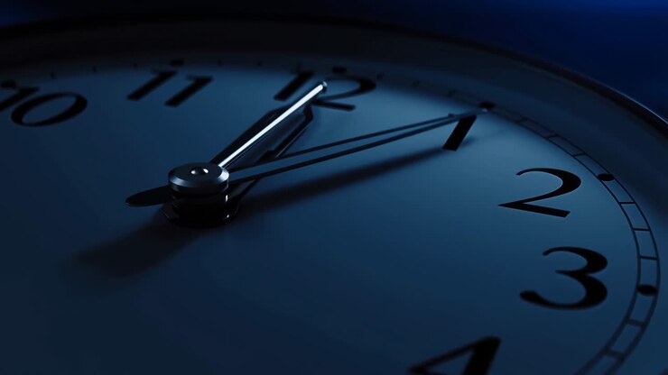 Close-up of a Clock Face at Night