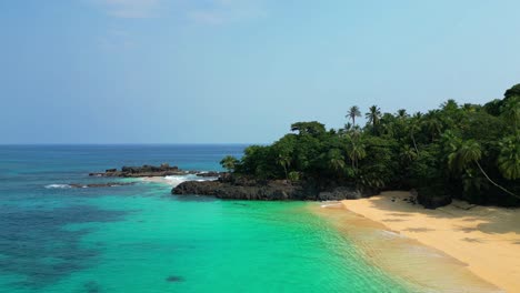 Aerial view from turquoise sea and green forest at Boi beah at Prince Island in Sao Tome e Principe,Africa