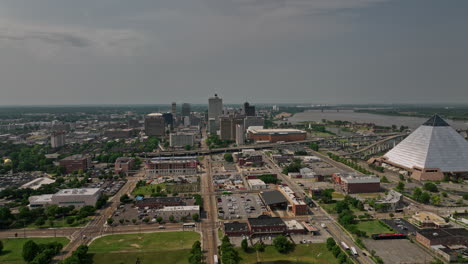 memphis tennessee aerial v43 cinematic low flyover uptown residential neighborhood towards downtown capturing iconic landmark pyramid and riverside urban cityscape - shot with mavic 3 cine - may 2022