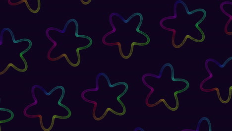 a vibrant arrangement of rainbow colored stars set against a black backdrop creates a striking and visually appealing pattern in this simple yet eye-catching image