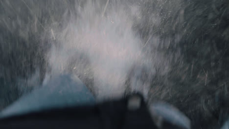 Jumping-on-a-frozen-tramoplin-in-the-winter-ice-flying-towards-camera-fun-pov