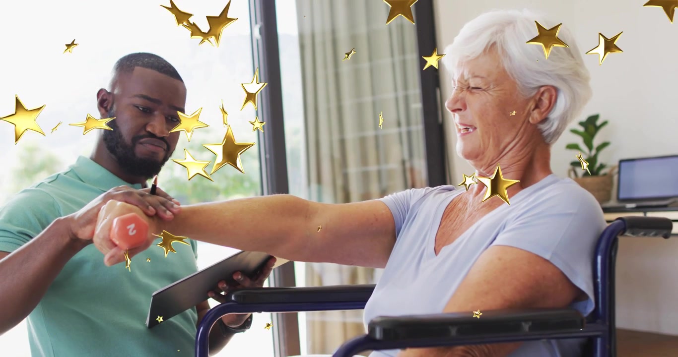 At start rehab therapist guiding patient arm extension with dumbbell recording progress on tablet