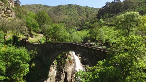 Bridge-Over-Waterfall-Aerial-View