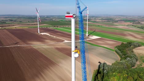 Wind-Turbine-Under-Construction-In-Rural-Landscape---aerial-shot