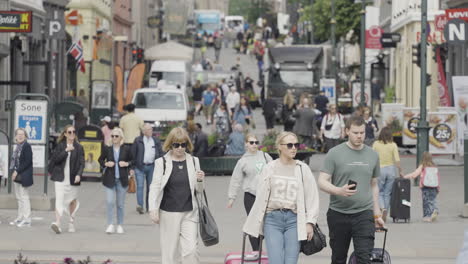 busy city street scene with pedestrians