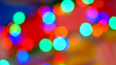 luces de colores borrosos. rojo, verde, amarillo, naranja, azul desenfocado bokeh brillante fondo festivo.