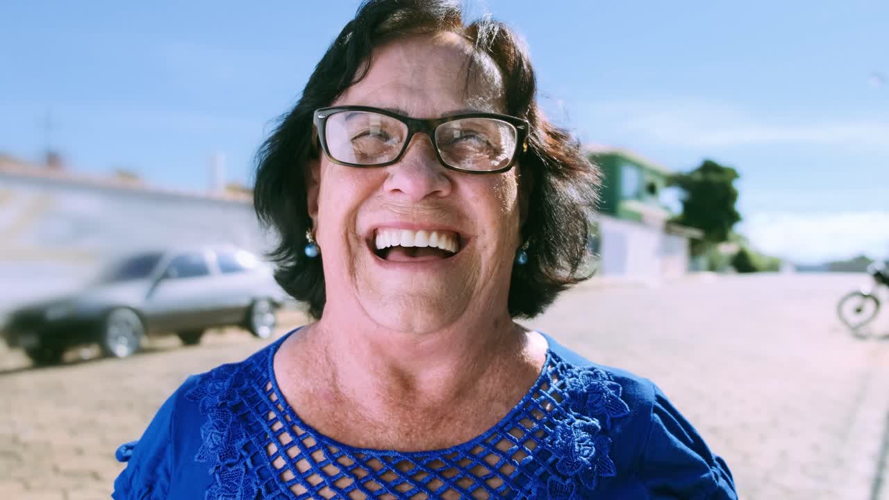 Portrait of a Smiling Woman with Glasses