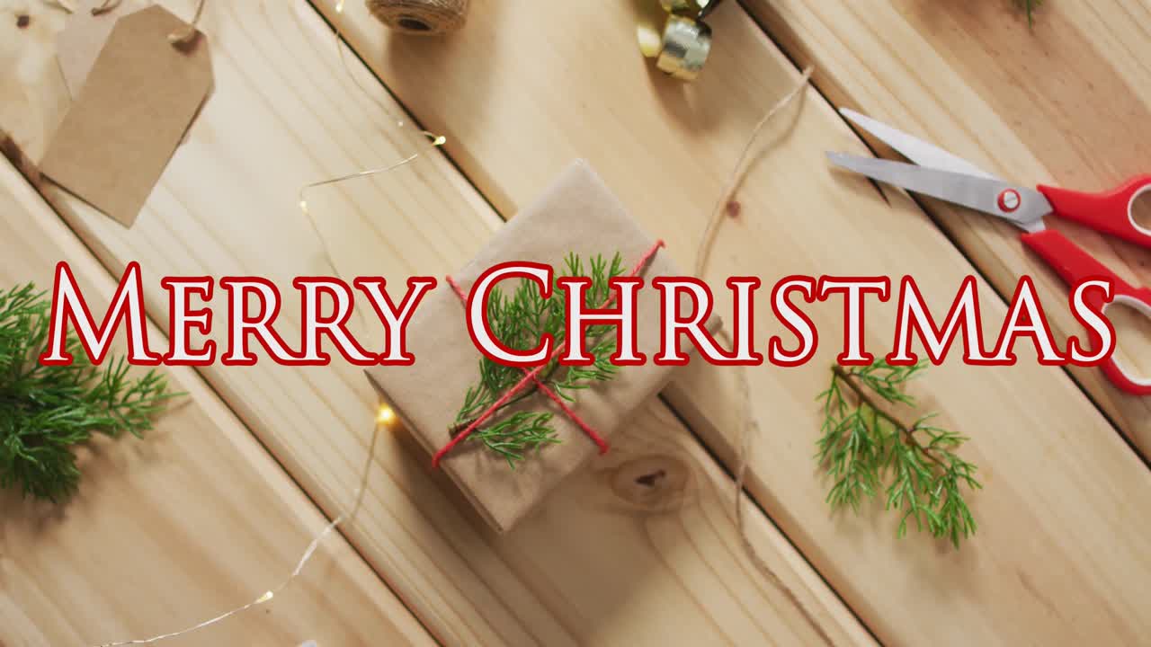 animación del texto de feliz navidad sobre la caja