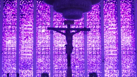 stained glass internal view of dom bosco church in brasilia - pan shot - cloudy day with trees outside