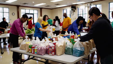 volunteers packing food bags at a community food distribution event