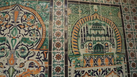 intricate tunisian ceramic tiles with islamic architecture patterns on a historic wall