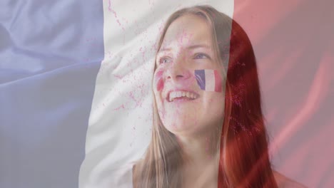 animation of flag of france over caucasian woman smiling