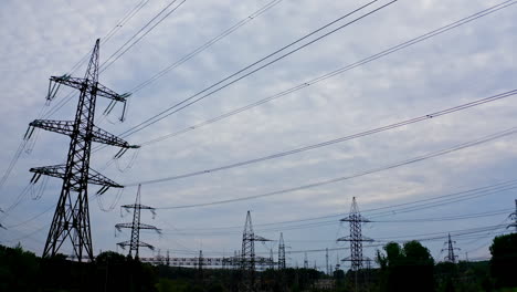 high voltage post. high voltage towers with electrical wires