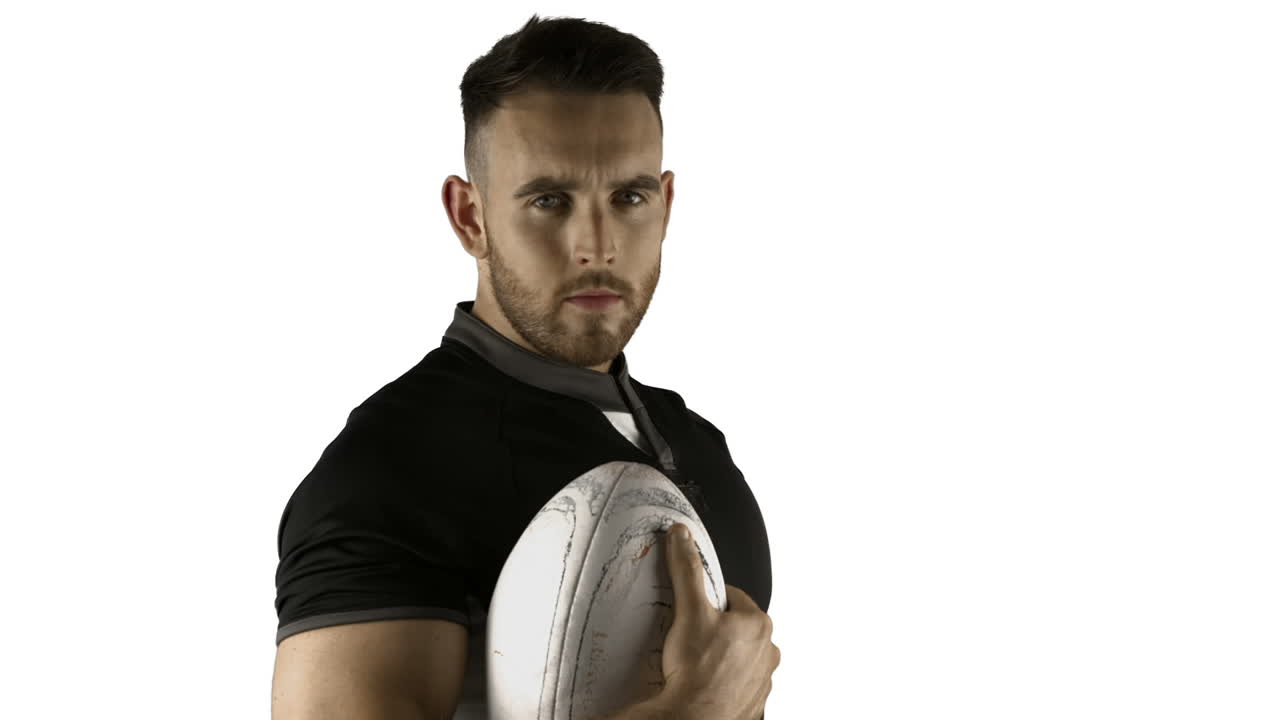Poważny rugbysta z piłką