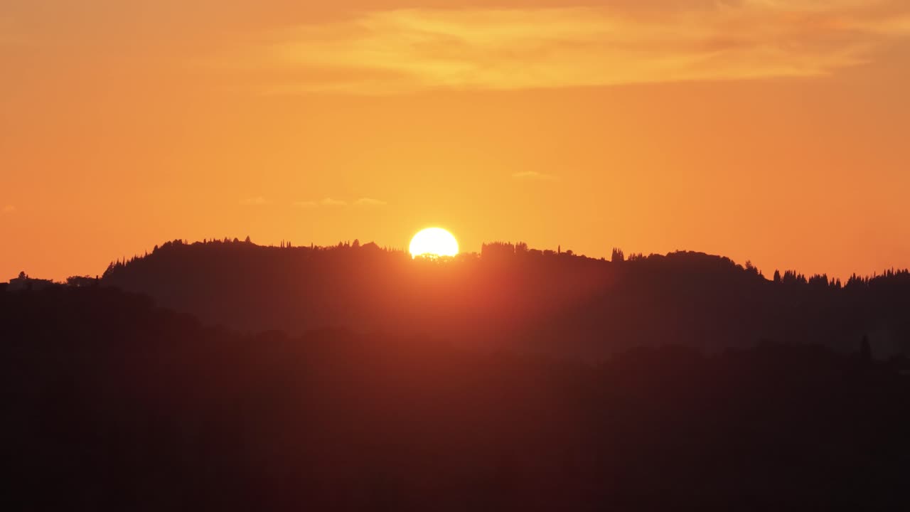 Golden Sun Setting Behind Silhouetted Mountains in Corfu Greece, Beautiful Orange Sky Landscape