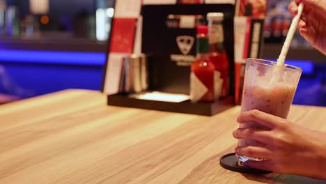 person enjoying a dessert drink at a restaurant