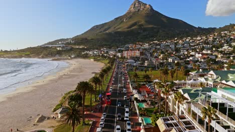 picturesque scene showcasing the beauty of this iconic cape town destination, camps bay beach during a summer's day.