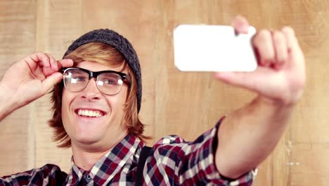 Hipster-taking-a-selfie-with-phone