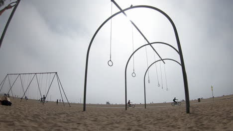 swinging on the santa monica rings