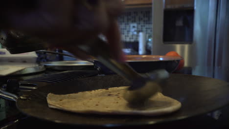 cooking roti on the stove top