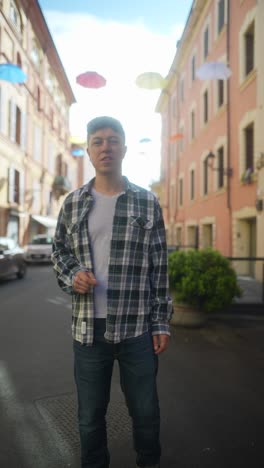 man walking in a european city street