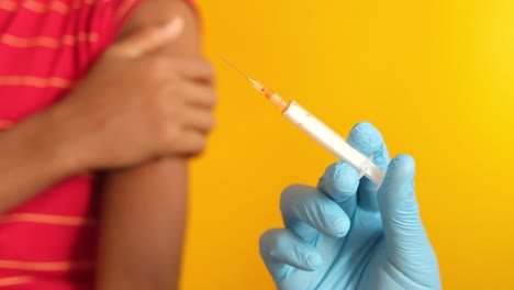 child receiving a vaccination