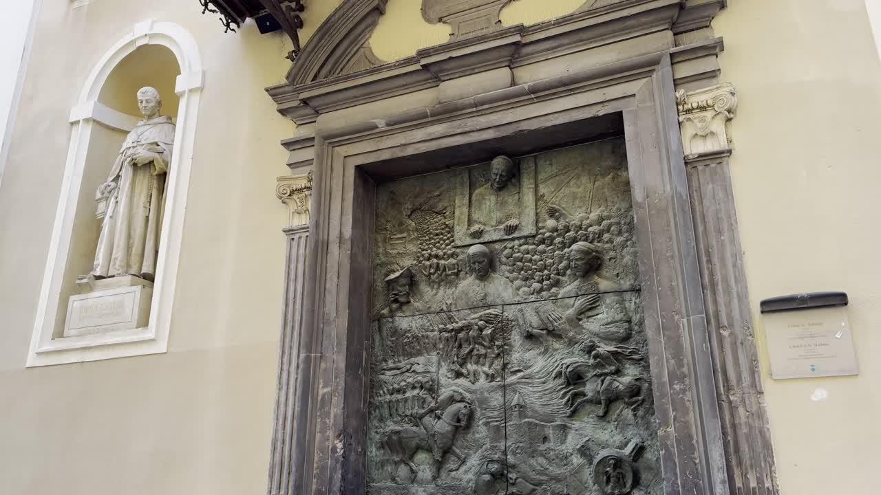 Walking towards Ljubljana's tourist attraction the 'Slovene Door', an incredible bronze sculpted door on St Nicholas' Cathedral