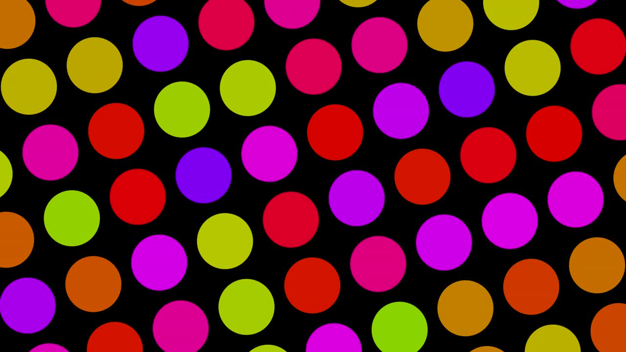 puntos multicolores que giran lentamente contra un fondo negro - bucle sin costuras. útil para niños con tdah, autismo o síndrome de asperger