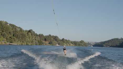 woman waterskiing on a river