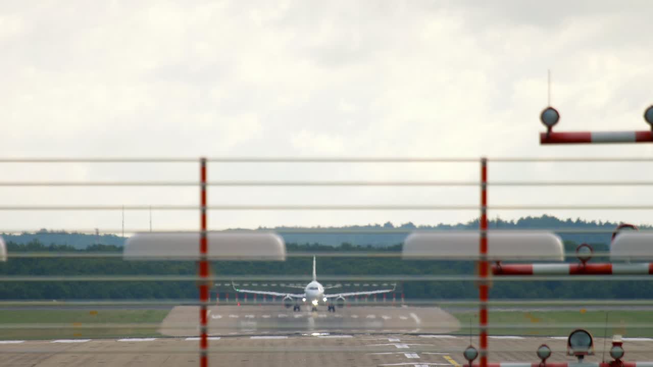Airplane on the runway, front view