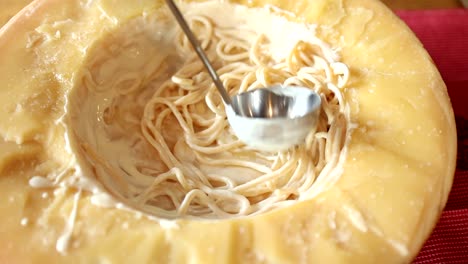 spaghetti carbonara in a parmesan cheese bowl