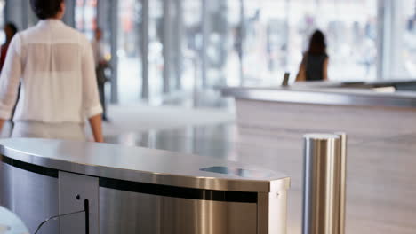 smart watch scanning to open gate in business lobby