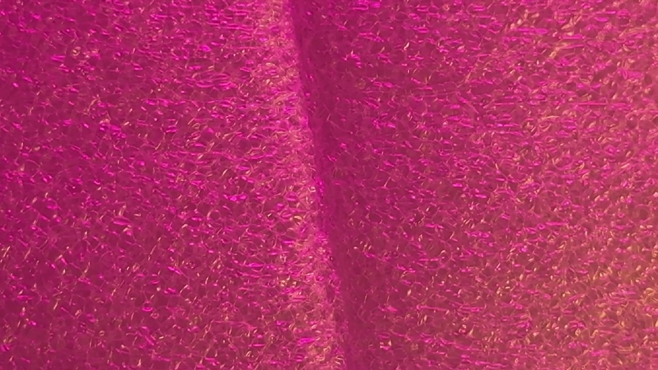 Superficie in tessuto texturizzato con colori vivaci