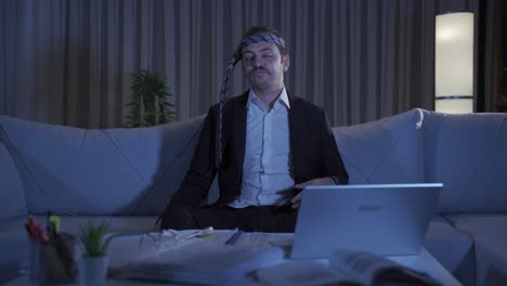 drunk businessman comes home and wants to work.